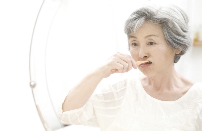  ​For patients who have suffered loss of mobility, geriatric dentists might suggest modifying toothbrushes to improve the grip. PHOTO ISTOCKPHOTO